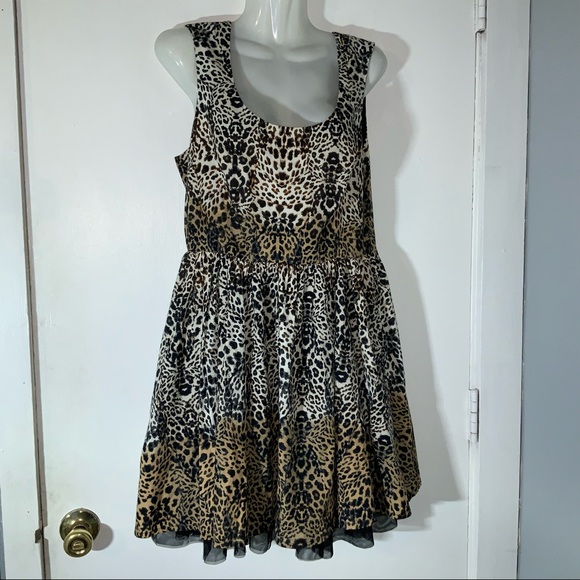 Jessica Simpson Dresses & Skirts - Leopard Print Fit Flare Summer Dress 11/12 Cutout back Jessica Simpson